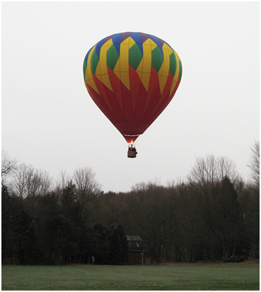 Hot air balloon taking off.