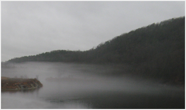 Fog on lake.